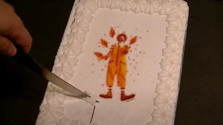 Ronald Birthday Cake being sliced