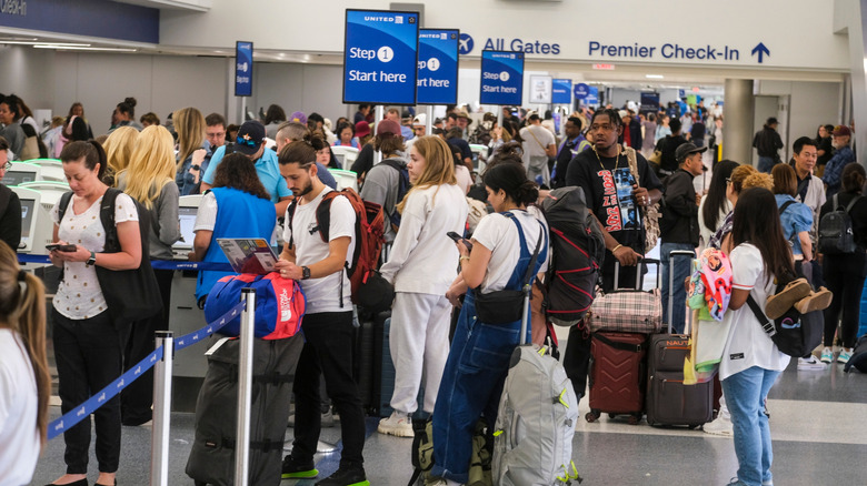 Long lines are pictured at an airport in Los Angeles.