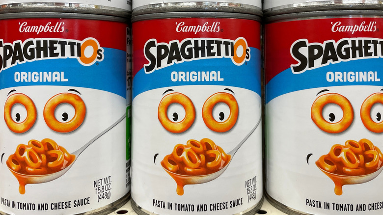 Cans of SpaghettiOs on the grocery store shelves