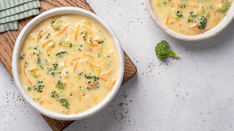 Top-down view of a bowl of broccoli cheddar soup