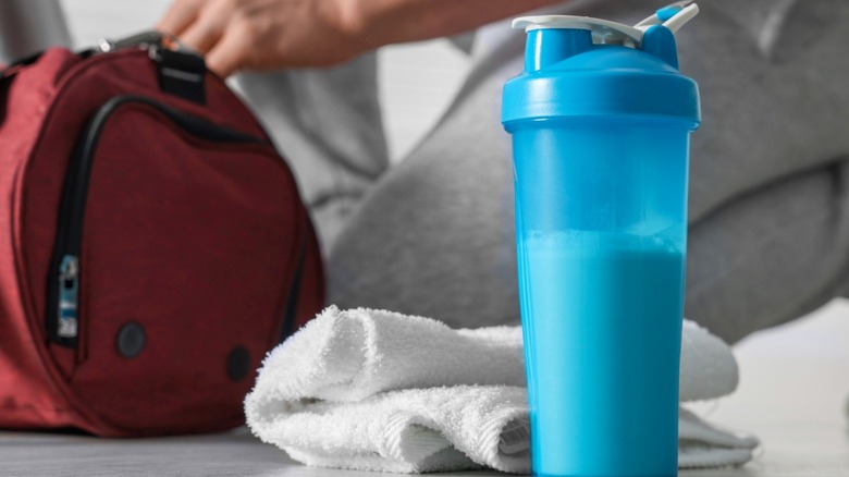 Protein shake in bottle at gym