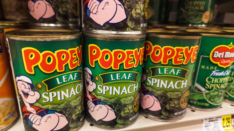 Popeye Leaf Spinach on grocery store shelf with canned produce display