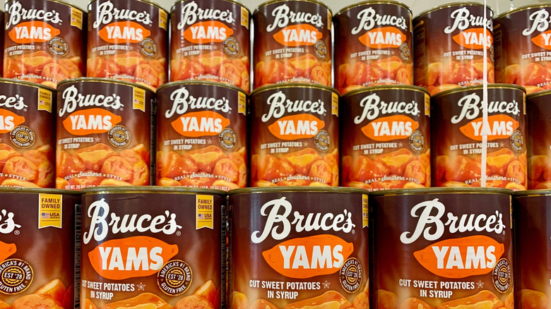 Bruce's yams cut sweet potatoes in syrup with price tag inside a store