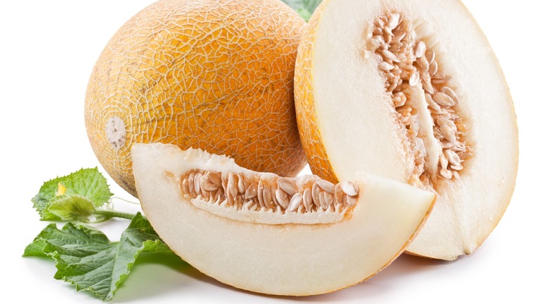 Galia melon halves with white interior flesh