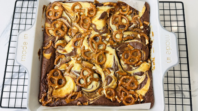Baked caramel pretzel brownies in baking dish