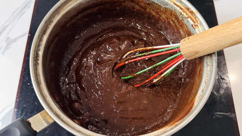 Brownie batter and whisk in bowl
