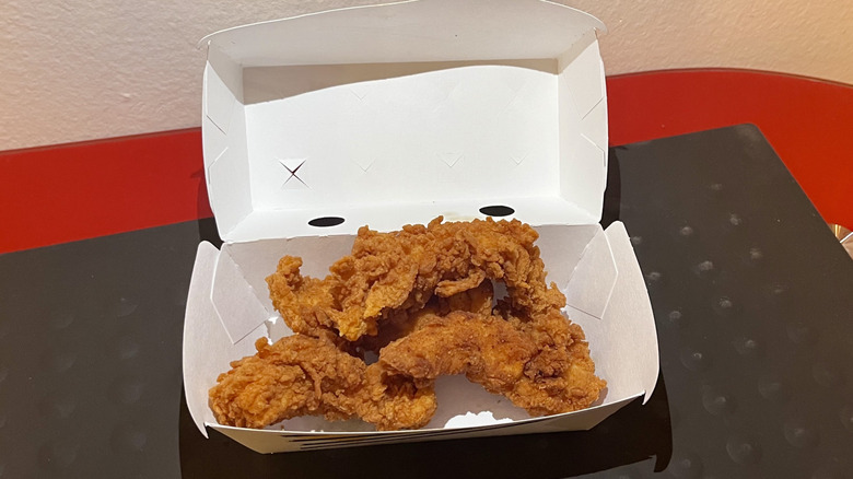 Hand-breaded Chicken Tenders from Carl's Jr. in their box