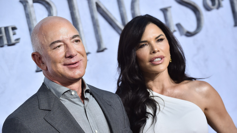 Jeff Bezos at a Lord of the Rings premier with his wife