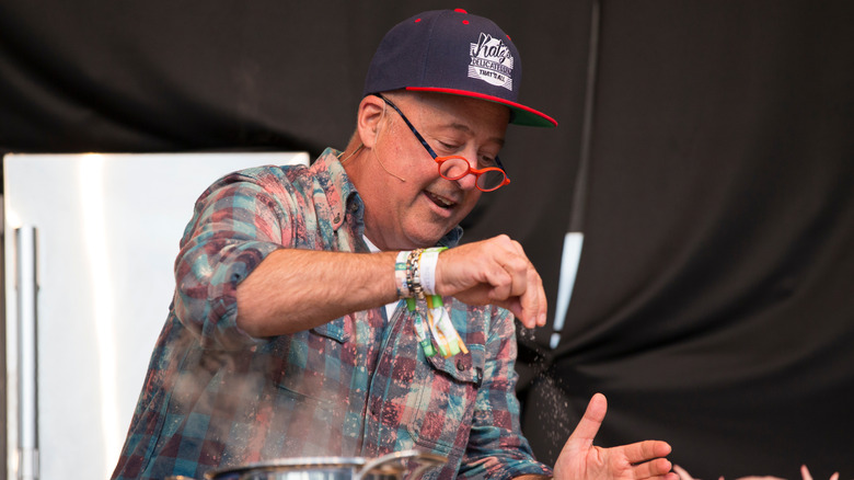 Andrew Zimmern giving a cooking demonstration