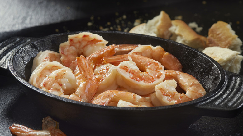 Skillet of cooked shrimp