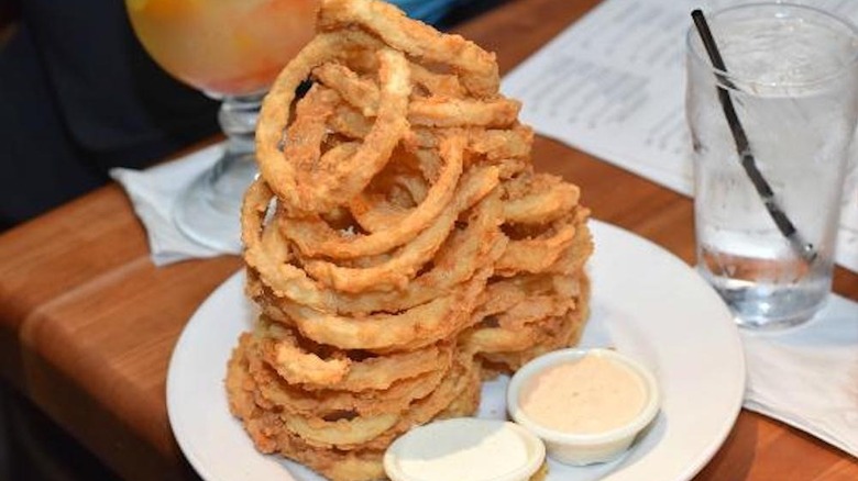 A stack of onion ring appetizers from Cheddar's restaurant
