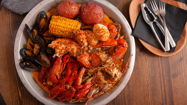 A seafood boil in a bowl on a table