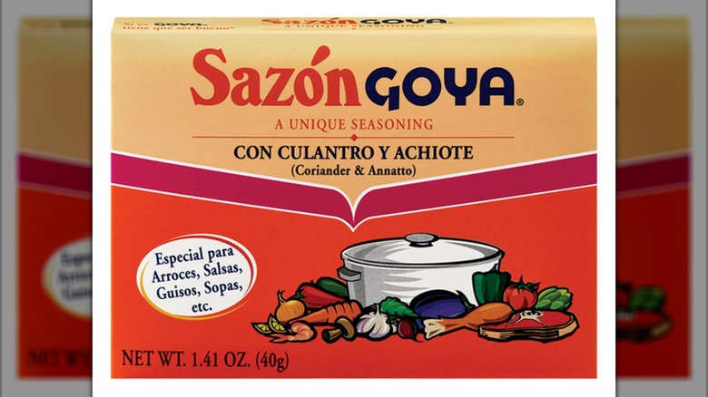 Package of Goya Sazón Seasoning on a white background.