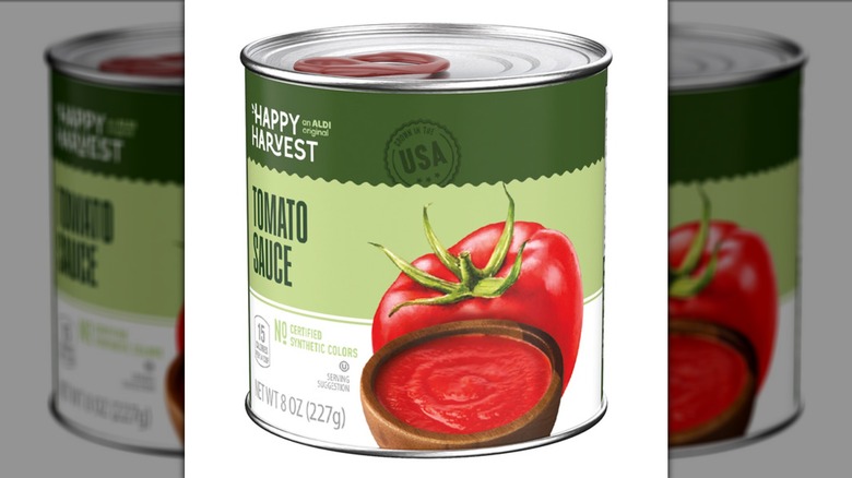 Can of Happy Harvest Tomato Sauce on a white background.