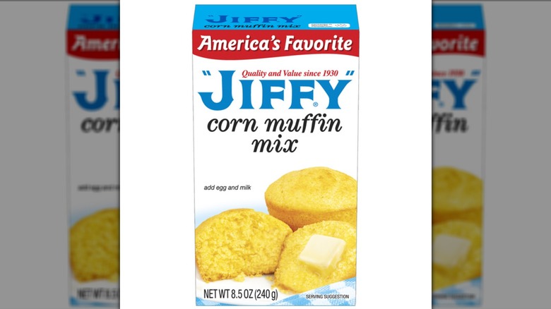 Box of Jiffy Corn Muffin Mix on a white background.