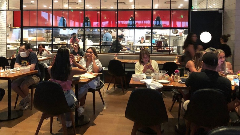 Diners eating inside a North Italia restaurant