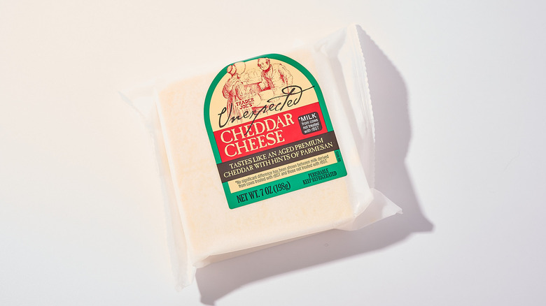 Packaged cheddar cheese on a table