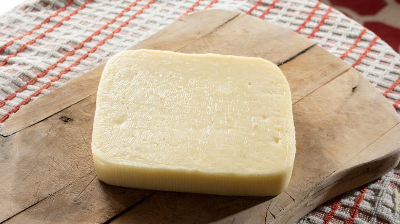 havarti on a wooden cutting board