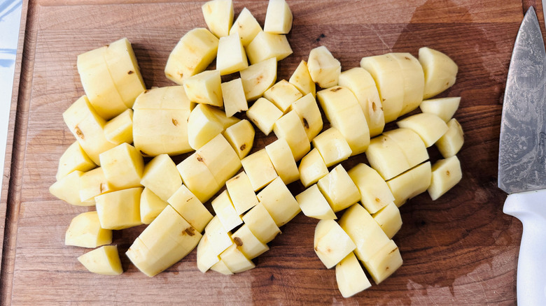 Chopped potatoes on cutting board