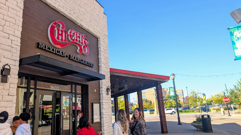 Exterior of a Chi-Chi's restaurant with several people about to enter