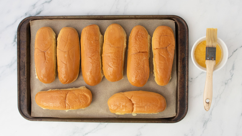 Hot dog buns brushed with egg wash