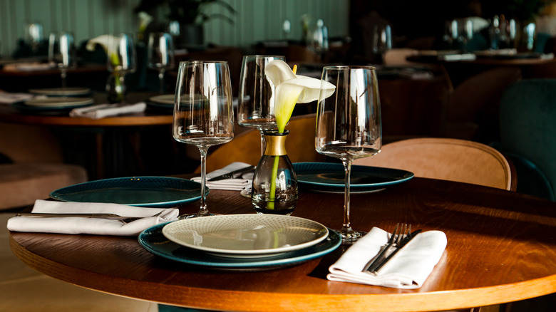 A nicely set table in an upscale restaurant