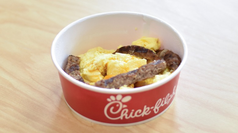 A Chick-fil-A breakfast bowl on a wooden table