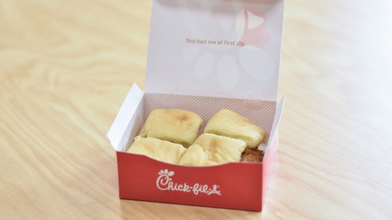 A box of Chick-fil-A chick-n-minis on a wooden table