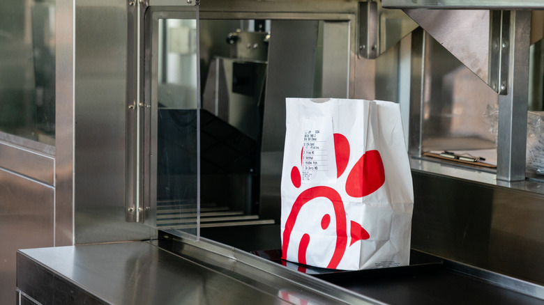 A Chick-fil-A takeout bag.