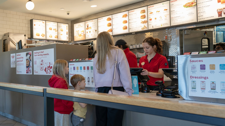Family placing an order at Chick-fil-A