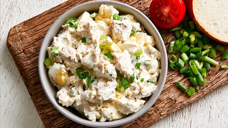 A bowl of creamy chicken salad.