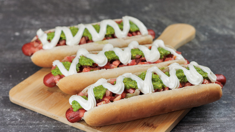 Three mayo topped completos