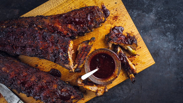 Ribs on a wooden serving board.
