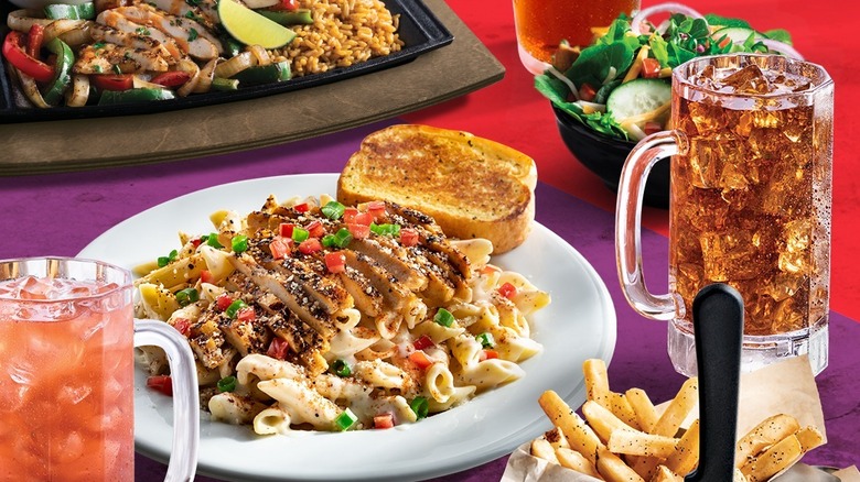 Collection of different Chili's dishes, including fajitas, creamy pasta with chicken, french fries, and more