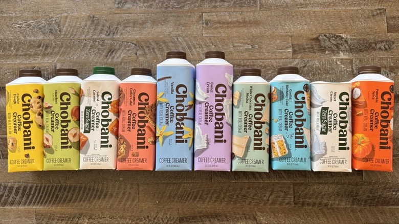 Chobani coffee creamers on wooden surface