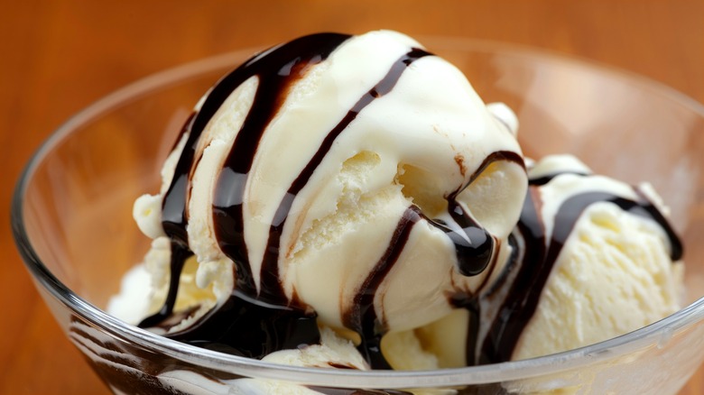 chocolate syrup drizzled on ice cream