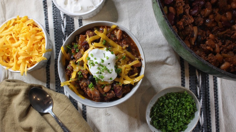 bowl of chili and fixings