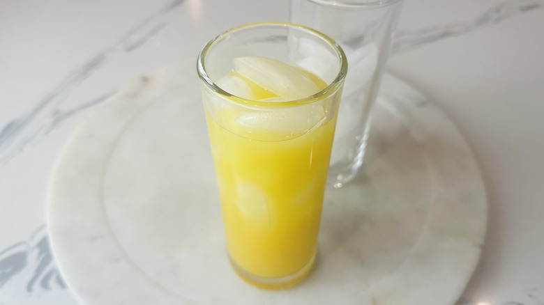 Orange juice and tequila over ice