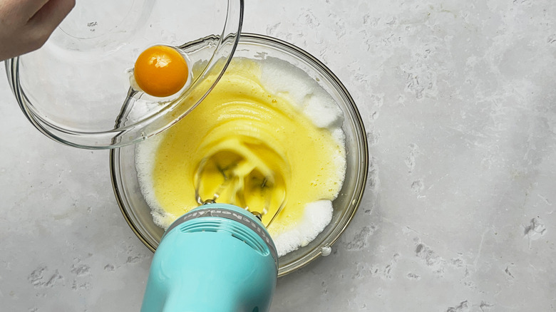 adding yolks to batter