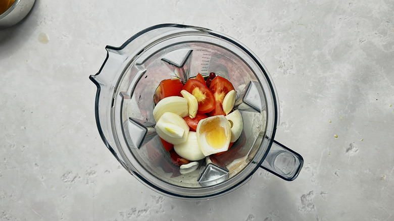 salsa ingredients in a blender