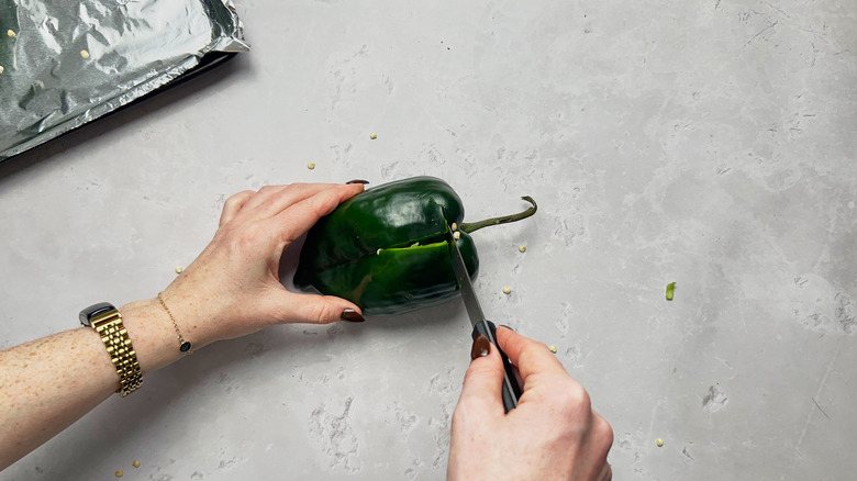 slicing peppers with knife