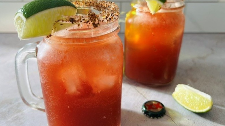micheladas with lime wedges