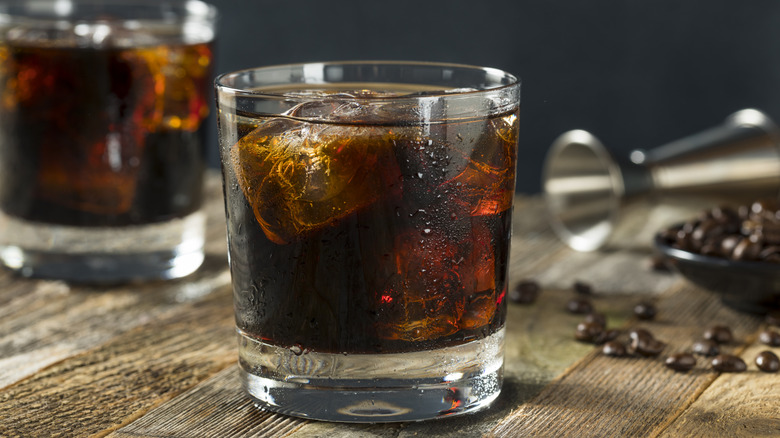 black russian cocktail in two glasses with ice