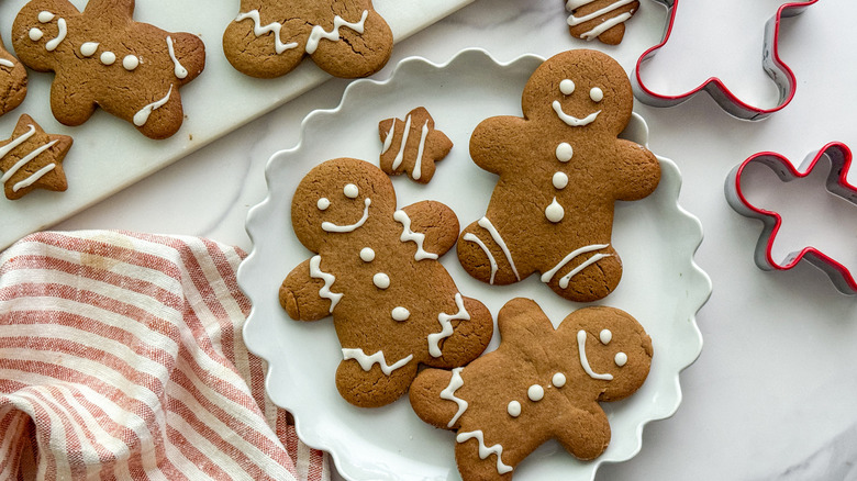 Decorated gingerbread men cookies on plate