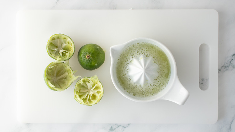 Limes juiced with manual juicer