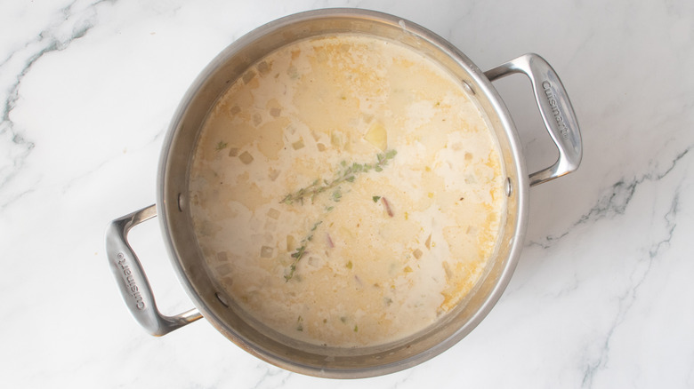 pinkish liquid in a metal pot