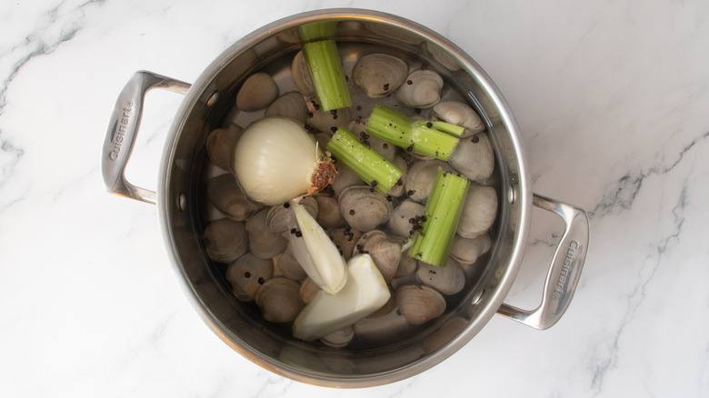 clams in a pot with vegetables