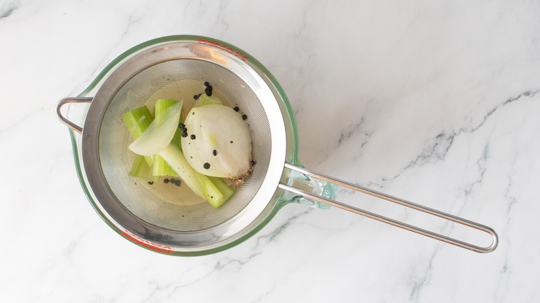 vegetables sitting in a strainer