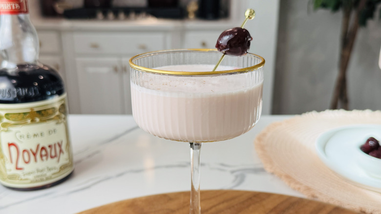 Pink squirrel cocktail in glass