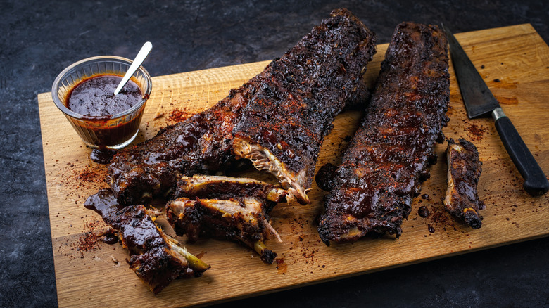 Barbecue ribs coated in sauce.